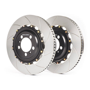 Two-piece Girodisc brake rotors with curved slots with black rotor hats and gold-colored hardware.